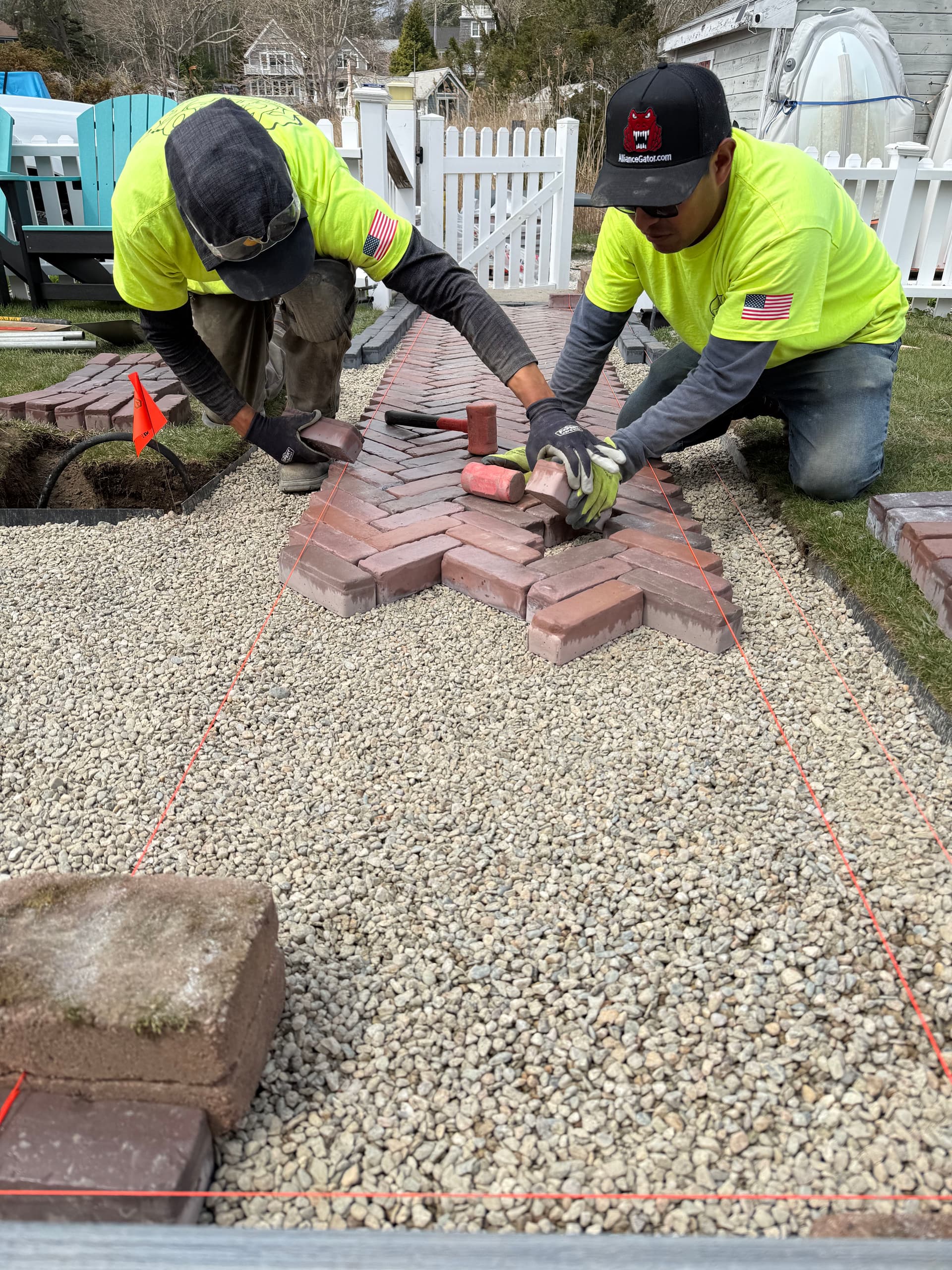 Unilock Tricolor Red Herringbone Walkway with Copthorne Basalt Border image