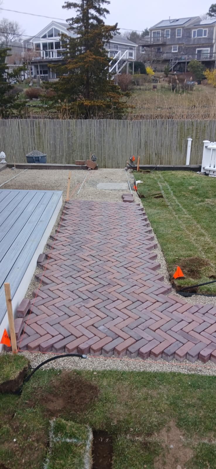 Gallery photos for Unilock Tricolor Red Herringbone Walkway with Copthorne Basalt Border: Image #2