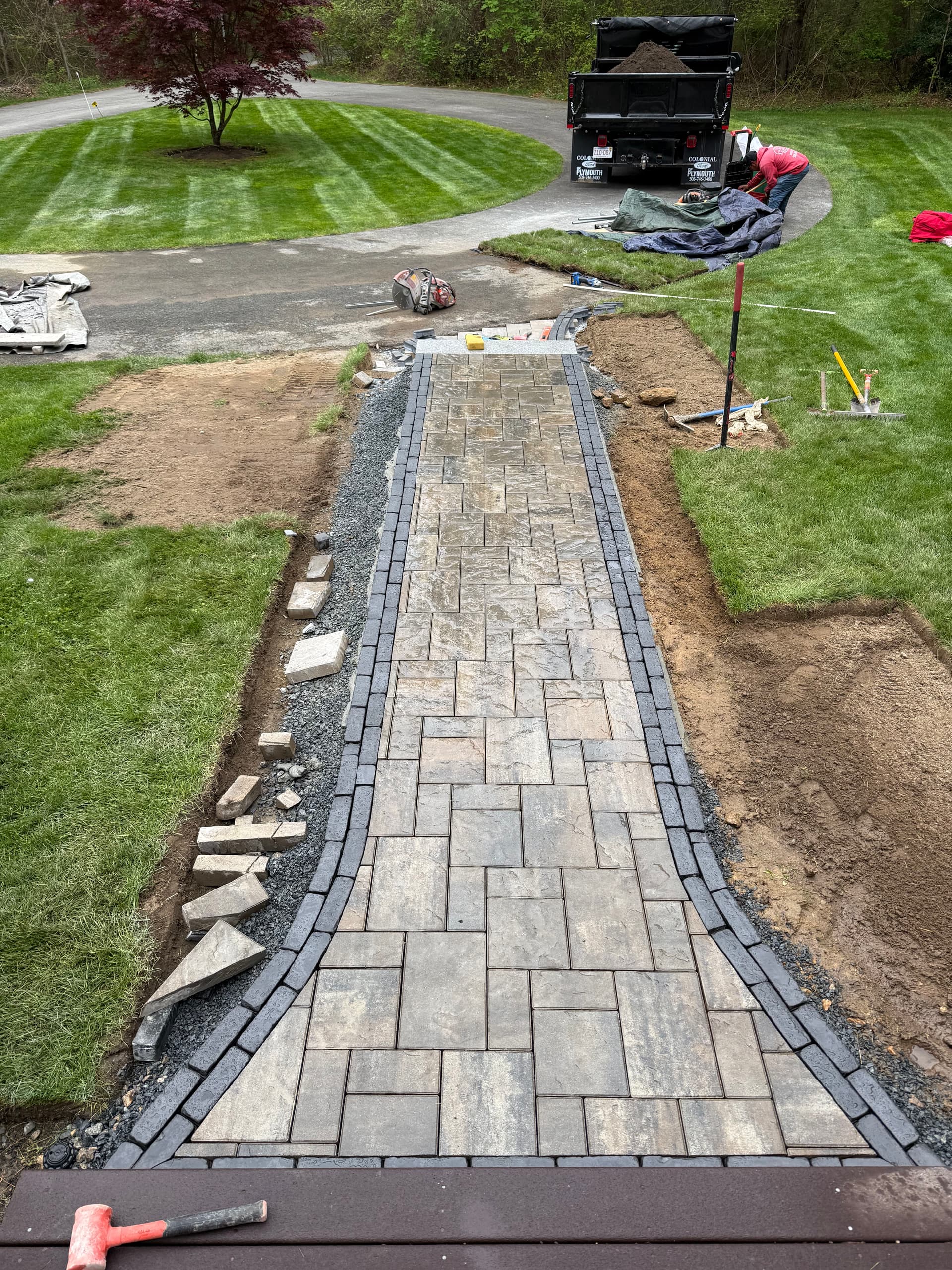 Gallery photos for Unilock Paver Walkway with Clean Lines and Sharp Borders: Image #1